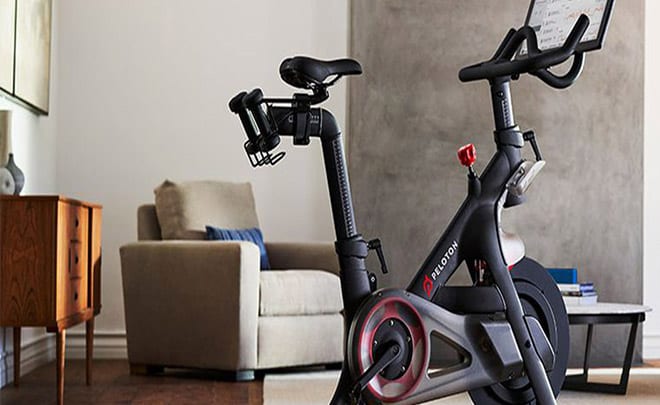 Peloton - Peloton machine with chair in background of a living room