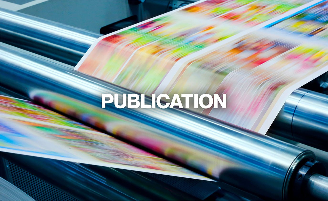 Publication - newspaper or magazine on printer roller with publication words on top