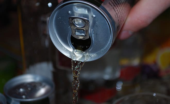 Picture of drink spilling out of can