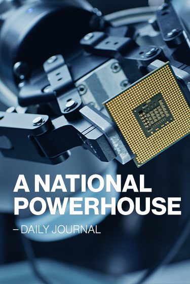 A national powerhouse text overlaid on computer chip background